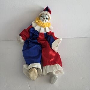 Noble Arts Inc. Red and Blue Clown Porcelain Doll with Yellow Polka Dot Collar